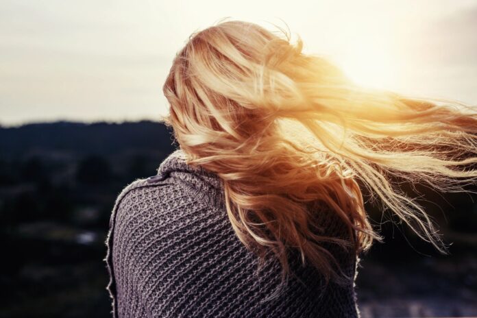 Woman reflecting on life journey